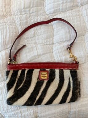 Dooney & Bourke Black and White Zebra Print Wristlet with Red Trim